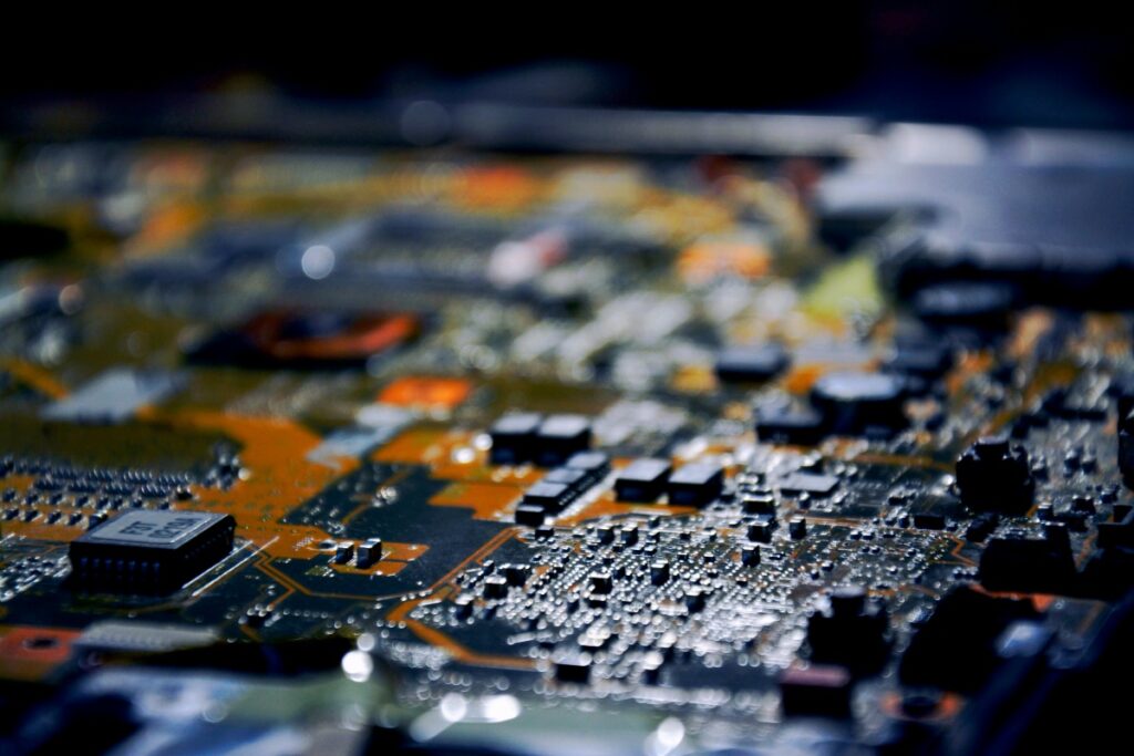 A close - up view of a printed circuit board, bustling with tiny components like chips and solder points. It's a complex world of electronics. Just as this board is filled with crucial elements for its function, "88 Essential SMT Questions Every Engineer Should Know" is packed with vital knowledge, helping engineers navigate the intricate realm of Surface Mount Technology.